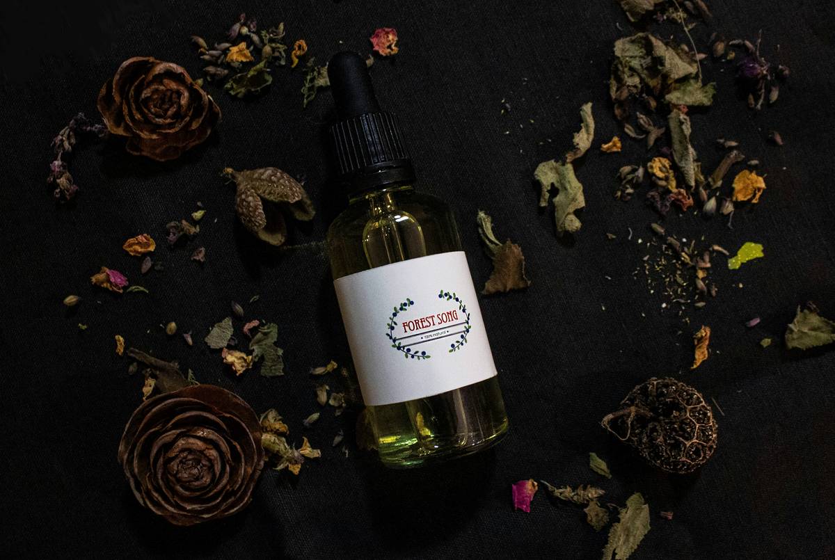 Applying moisturizing oil basic skin care routine on damp skin for maximum absorption